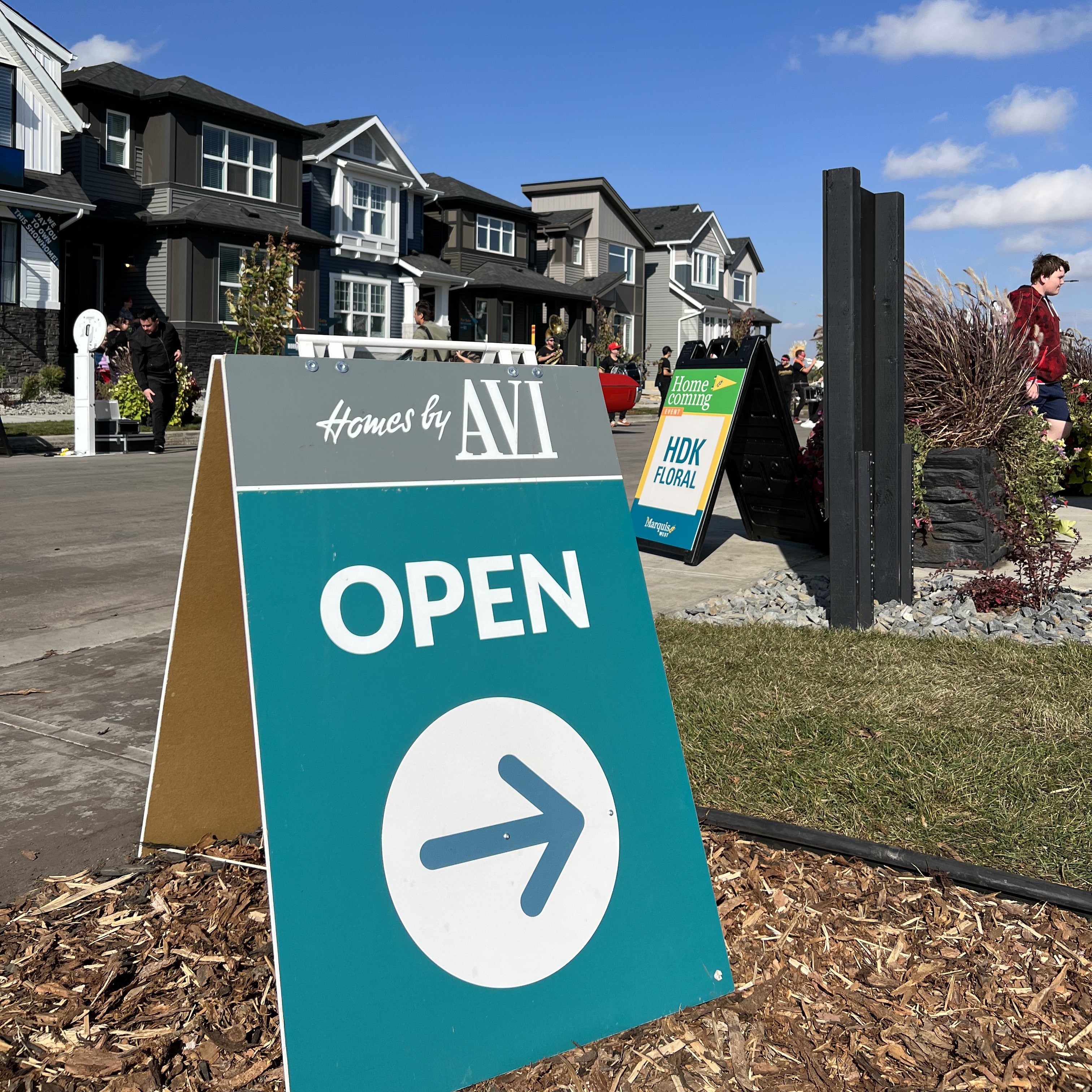 Homes by Avi show home sign says 'OPEN'
